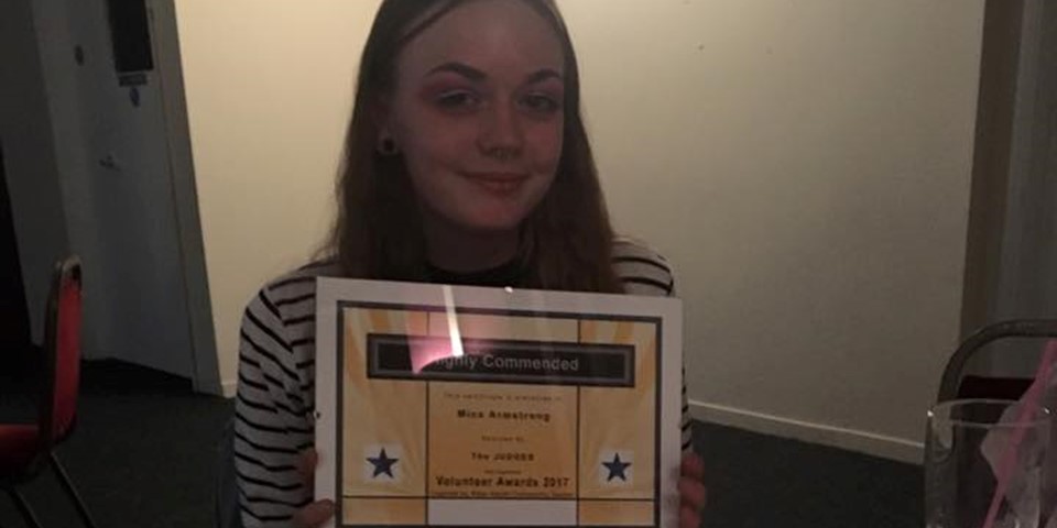 Mica Armstrong Receiving Volunteers Award Project V Leader